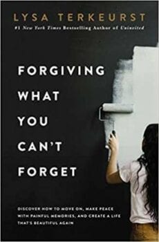 Black book cover with young girl painting black wall with white paint that signifies overcoming unforgiveness, Forgiving What You Can't Forget.