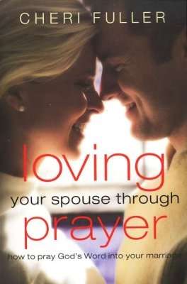 Happy wife and husband cuddling with smile on their faces with written statement, Loving Your Spouse Through Prayer.