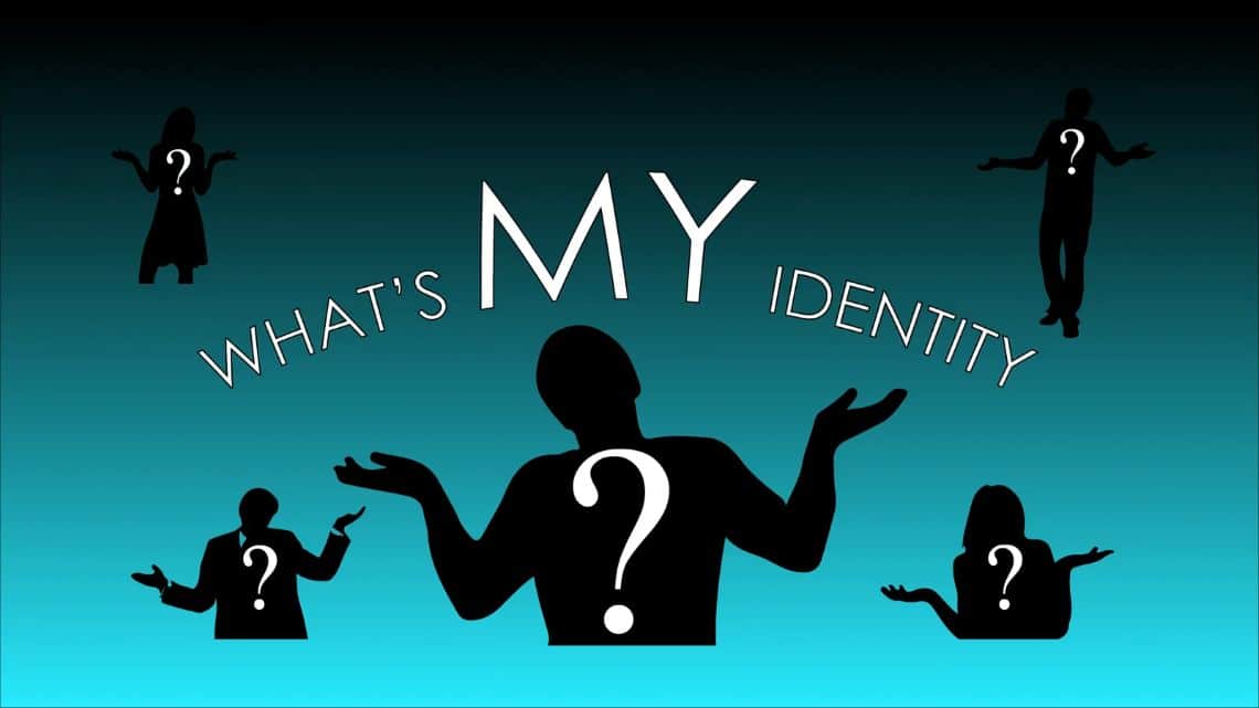 Silhouette of a person surrounded by question marks, representing identity crisis. "What's My Identity?