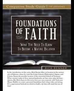 Open Bible stating Foundations of Faith in white letters on black background.