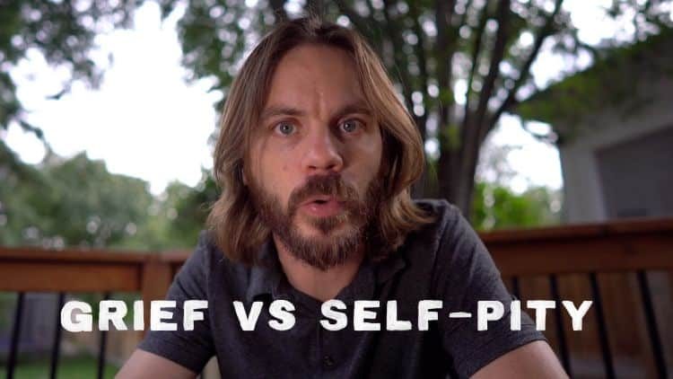 Man with long brown hair and beard speaks directly to the camera, with the text "GRIEF VS SELF-PITY" overlaid on the image.